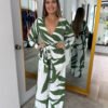 ee916628-defe-4a9f-8a55-0bf7c5f7de4a.jpeg Green Tropical print jumpsuit with long sleeves