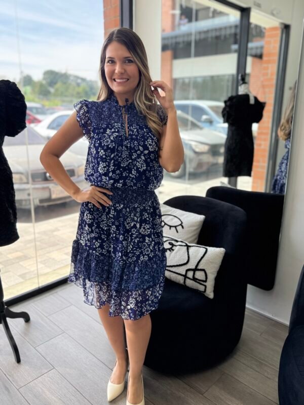 7686fa36-8f73-4e01-b790-6942d4836a88.jpeg Navy Floral Smocked Mini Dress