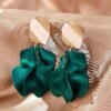 89d18dd4-41ed-446e-b629-d87b9f3b05a8.jpeg Green Andkiss Petal Drop Earrings