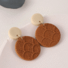 9e7e36a2-4dc1-48dc-8397-e5e55232062c.png Coffee Color Circle Textured Statement Earrings