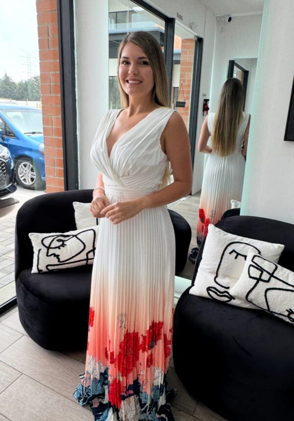 Pleated maxi dress with floral print on the bottom